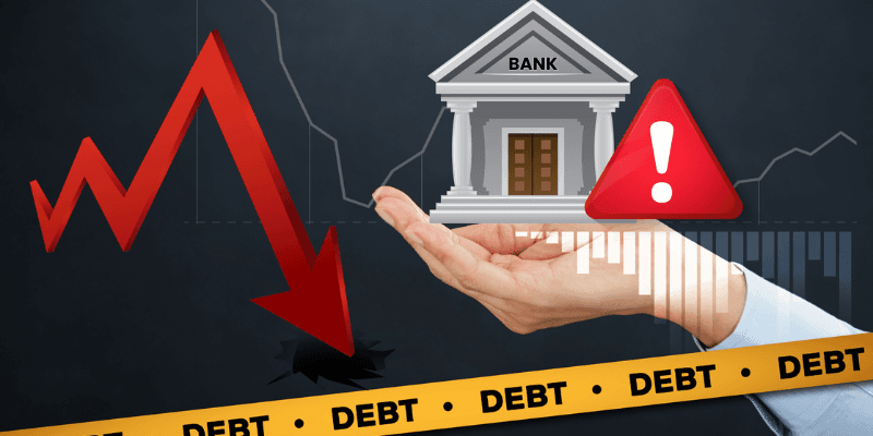 Picture of debt and bank indicating that HMRC can take money if you refuse to pay and have sufficient money in the bank account